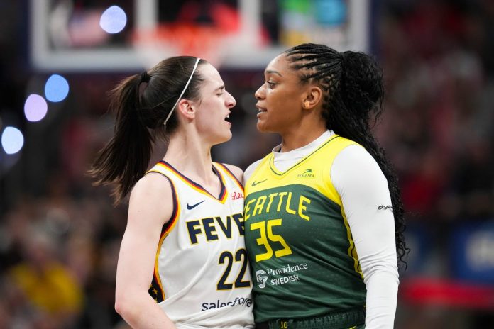 Indiana Fever guard Caitlin Clark and Seattle Storm guard Victoria Vivians exchange words. Joe Timmerman, IndyStar/USA TODAY NETWORK