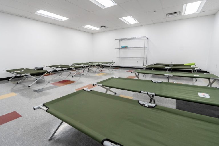 Green cots rest empty at an El Paso, Texas, shelter on Aug. 14, 2023, after a significant reduction in asylum-seekers crossing the Rio Grande. Omar Ornelas / USA Today Network