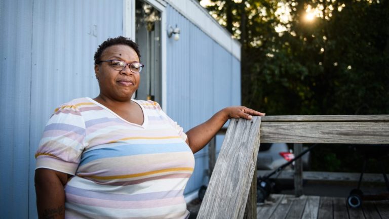 An increasing number of Americans, including Stacey Freeman of North Carolina, struggle with energy poverty, including the inability to afford utilities to heat or cool one’s home. “Sometimes I have to choose whether I’m going to pay the light bill,” Freeman says, “or do I pay all the rent or buy food or not let my son do a sport?” (Andrew Craft for KFF Health News)