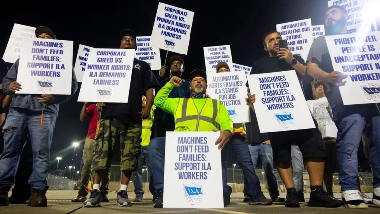 Longshoremen strike at midnight at Bayport Terminal on Tuesday, Oct. 1, 2024, in Houston. (AP Photo/Annie Mulligan)