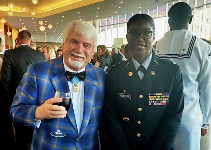 Cadet Maj. Kiana Hampton, executive officer for Sam Houston High School’s Junior Reserve Officers Training Corps (JROTC) with U.S. Army Spc. 5 James C. McCloughan. (Photo courtesy of Kiana Hampton)