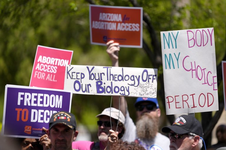 Abortion rights supporters gather outside the Capitol, Wednesday, April 17, 2024, in Phoenix. (AP Photo/Matt York, File)