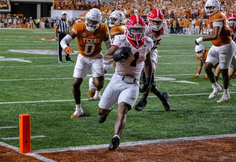 Georgia running back Trevor Etienne (1) runs into the end zone for a touchdown against Texas during the first half of an NAA college football game in Austin, Texas, Saturday, Oct. 19, 2024. (AP Photo/Rodolfo Gonzalez)