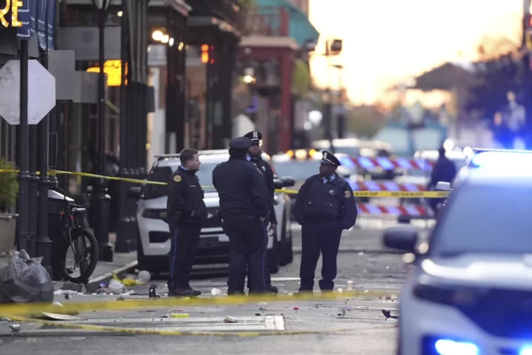 Emergency workers attend to the scene on Bourbon Street after a vehicle drove into a crowd on New Orleans’ Canal and Bourbon streets on Wednesday. Gerald Herbert/AP