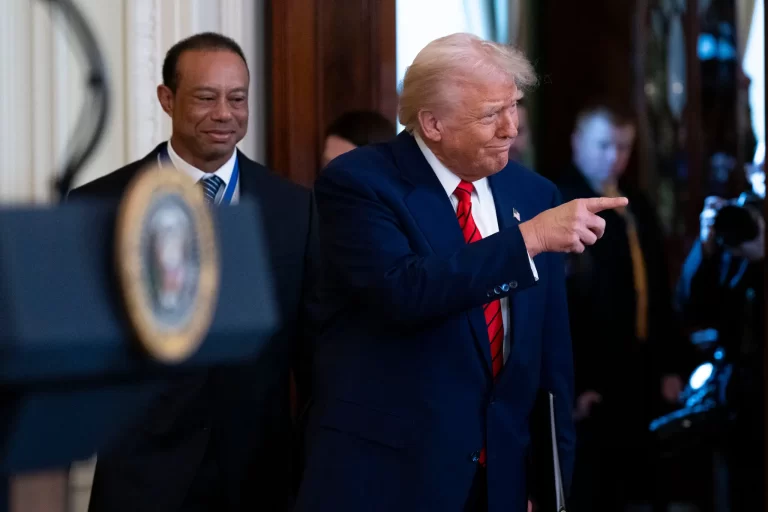 President Trump with Tiger Woods as he hosted a reception honoring Black History Month in the East Room of the White House on Thursday.Credit...Doug Mills/The New York Times