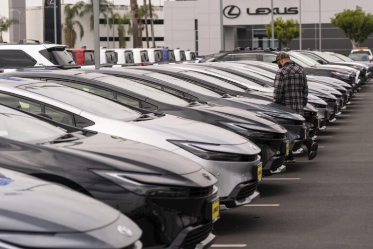 A person looks at a new vehicle at a Toyota Dealership in El Monte Calif., Thursday March 27, 2025 (AP)