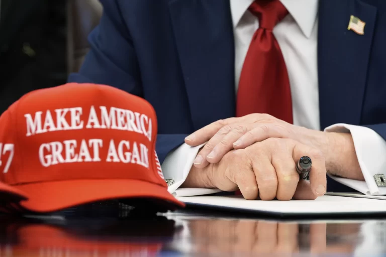 President Donald Trump speaks with reporters as he signs an executive order in the Oval Office of the White House, Wednesday, April 23, 2025, in Washington. (AP Photo/Alex Brandon)