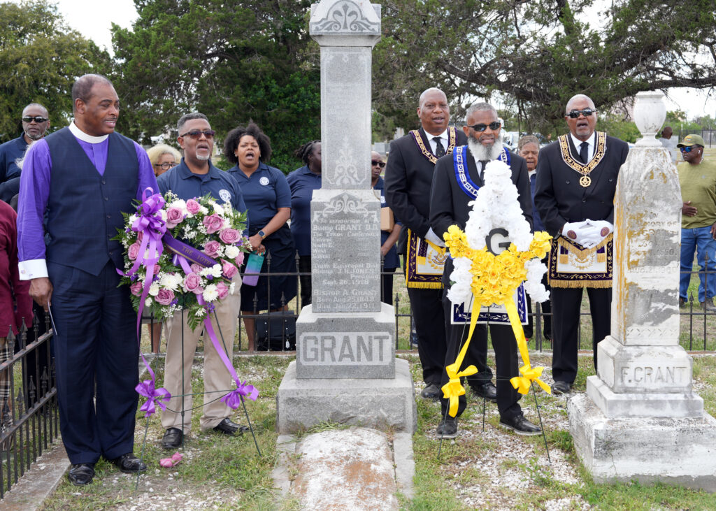 Members of the 19th Masonic District and 10th Episcopal District of the African Methodist Episcopal (A. M. E.) Church sing “Amazing Grace”