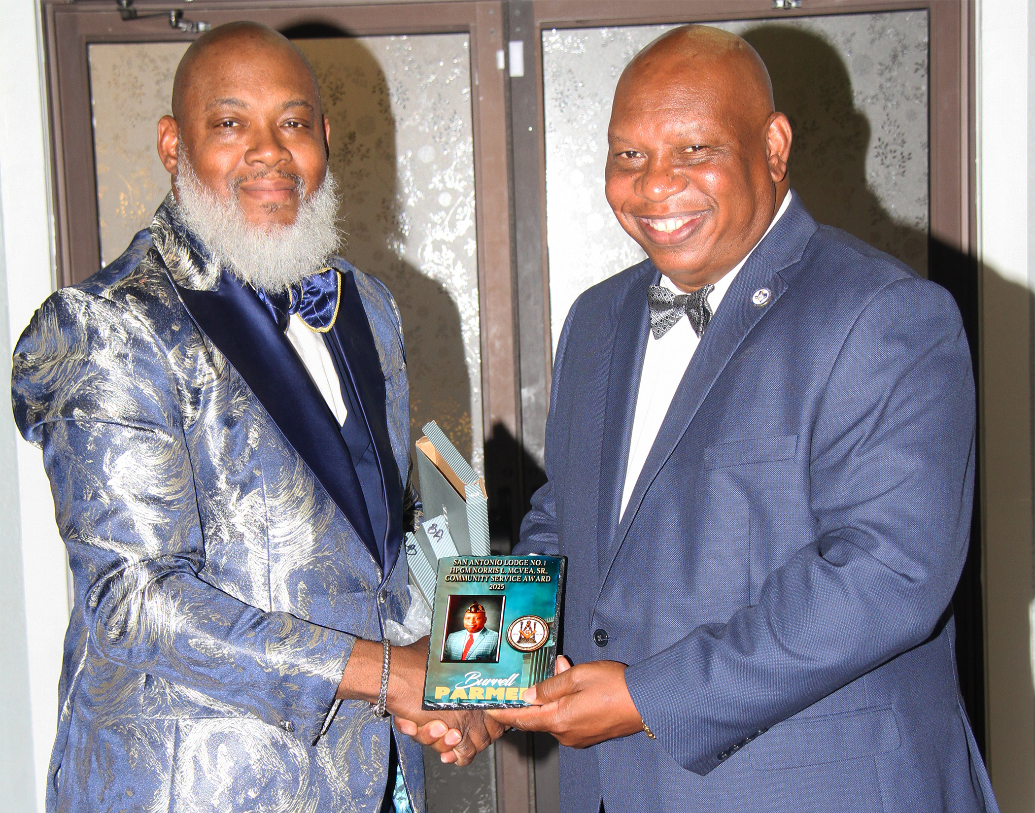 Past Master Burrell Parmer (right) of San Antonio Lodge No. 1 was presented the Honorary Past Grand Master Norris L. McVea Sr. Community Service Award. (Photo by Bro. Tostey Bass)
