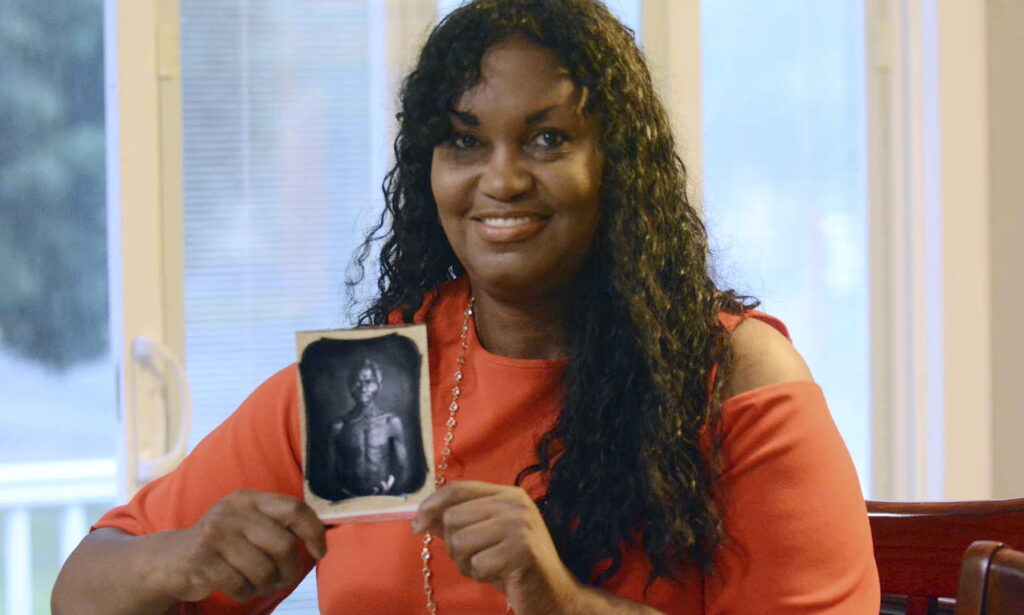 Tamara Lanier holds an 1850 photograph of Renty, a South Carolina slave who Lanier said is her family’s patriarch, at her home in Norwich, Connecticut. Photograph: John Shishmanian/AP