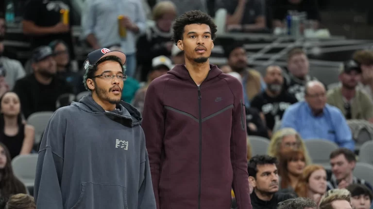 Mar 10, 2025; San Antonio, Texas, USA; San Antonio Spurs forward Jeremy Sochan (10) and center Victor Wembanyama (1) look on in the second half against the Dallas Mavericks at Frost Bank Center. / Daniel Dunn-Imagn Images