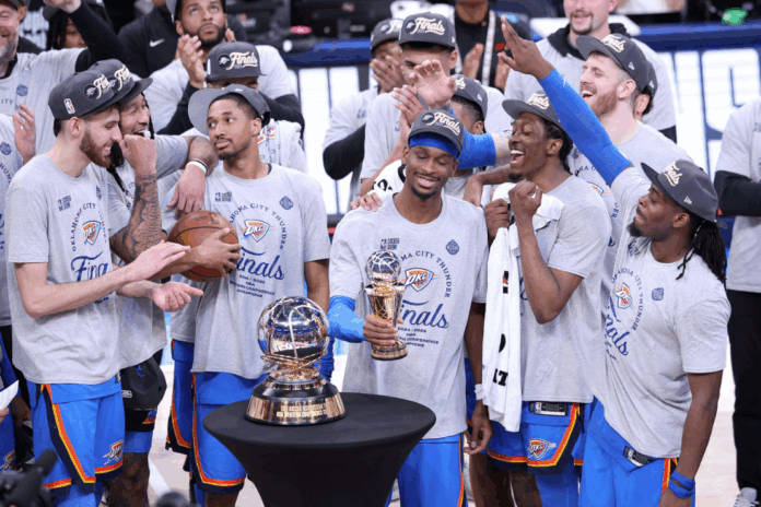 Shai Gilgeous-Alexander of the Oklahoma City Thunder celebrates with teammates at Paycom Center in Oklahoma City on Wednesday.William Purnell / Getty Images
