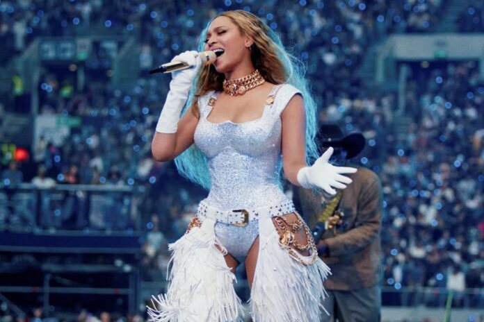 Beyoncé performing on stage during her Cowboy Carter tour, where unreleased music was stolen ahead of her Atlanta shows