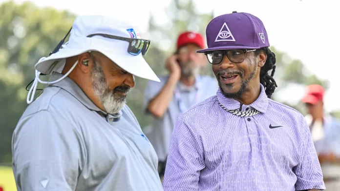 Comedian Katt Williams on the golf course with ESPN analyst Michael Collins