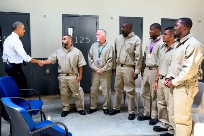 Obama greets prisoners. In 2015, President Barack Obama was the first sitting President to visit a federal prison. Photo: The Progressive