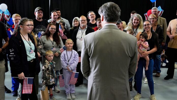 Deputy Secretary of State Christopher Landau greets Afrikaner refugees from South Africa, May 12, 2025, at Dulles International Airport in Dulles, Va. (AP Photo/Julia Demaree Nikhinson, File)