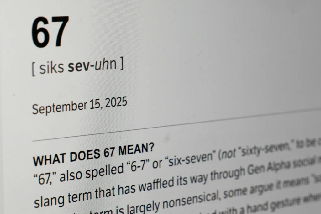This Dictionary.com page shows the newest word of the year "6-7" on a computer screen, Thursday, Oct. 30, 2025, in Chicago. (AP Photo/Kiichiro Sato)