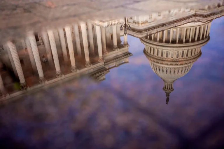 The Dome of the U.S. Capitol Building is visible in reflection on October 14, in Washington, D.C. Andrew Harnik / Getty Images
