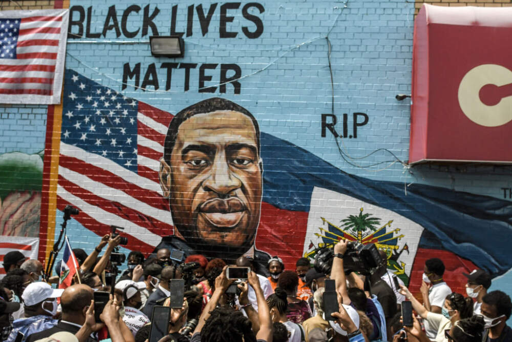 NEW YORK, NY - JULY 13: A mural painted by artist Kenny Altidor depicting George Floyd is unveiled on a sidewall of CTown Supermarket on July 13, 2020 in the Brooklyn borough New York City. George Floyd was killed by a white police officer in Minneapolis and his death has sparked a national reckoning about race and policing in the United States.  (Photo by Stephanie Keith/Getty Images)
