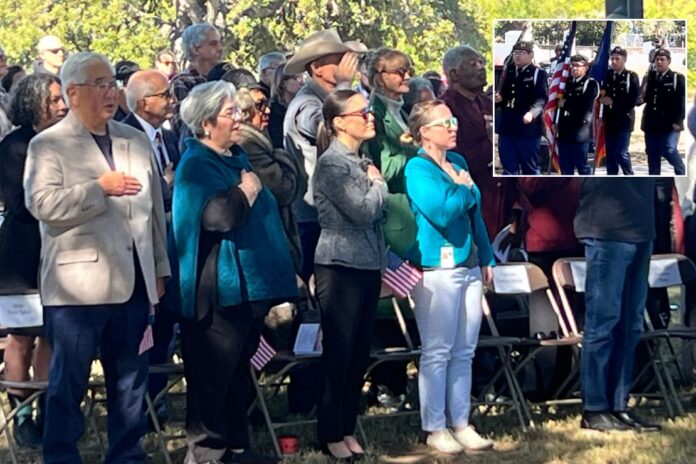 (L-R) Bexar County Judge Peter Sakai, Mrs. Sakai and Mayor Gina Ortiz Jones at the Bexar County Buffalo Soldiers Veterans Day Ceremony at the San Antonio National Cemetery | SA Observer