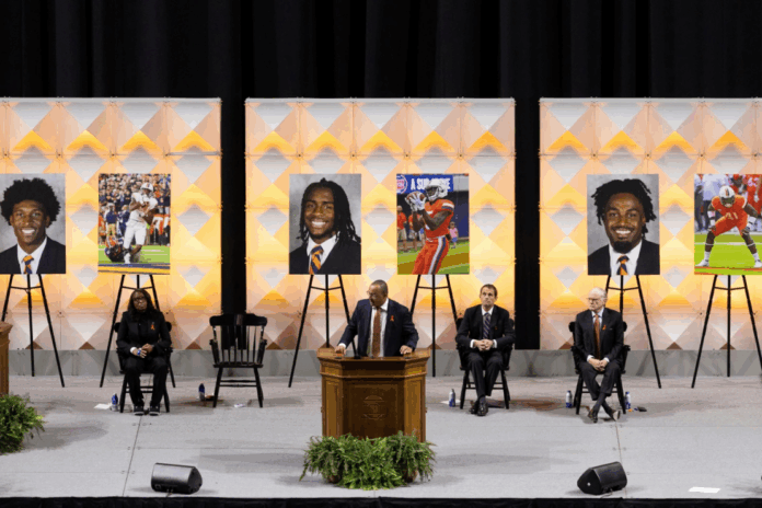 University of Virginia head football coach Tony Elliott speaks at a memorial service for three football players that were fatally shot, in Charlottesville, Va., on Nov. 19, 2022. Mike Kropf / The Daily Progress via AP, file
