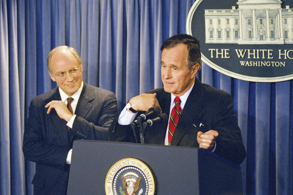 President George H.W. Bush gestures during a news conference at the White House on Friday, March 10, 1989, where he announced his selection of Rep. Richard Cheney, R-Wyo., left, to become Defense Secretary replacing his last choice of John Tower, whose nomination was turned down by the senate Thursday. (AP Photo/Charles Tasnadi, file)
Former Vice President Dick Cheney watches he attends a primary Election Night gathering for his daughter, Rep. Liz Cheney, R-Wyo., Tuesday, Aug. 16, 2022, in Jackson, Wyo. Cheney lost to challenger Harriet Hageman in the primary. (AP Photo/Jae C. Hong, file)
6 of 6 |  Former Vice President Dick Cheney watches he attends a primary Election Night gathering for his daughter, Rep. Liz Cheney, R-Wyo., Tuesday, Aug. 16, 2022, in Jackson, Wyo. Cheney lost to challenger Harriet Hageman in the primary. (AP Photo/Jae C. Hong, file)