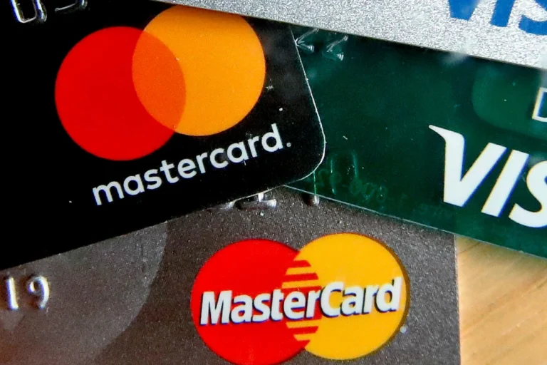 In this Feb. 20, 2019, file photo are Mastercard and Visa credit cards in Zelienople, Pa. (AP Photo/Keith Srakocic, File)