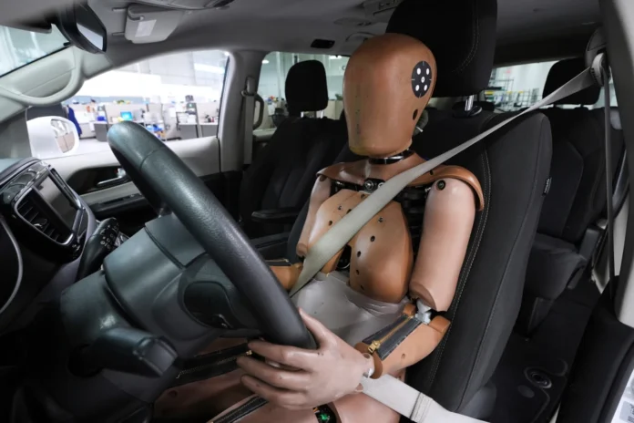 A THOR-5F female crash test dummy is shown in a driver’s seat at Humanetics in Farmington Hills, Mich., June 10, 2025. (AP Photo/Paul Sancya, File)