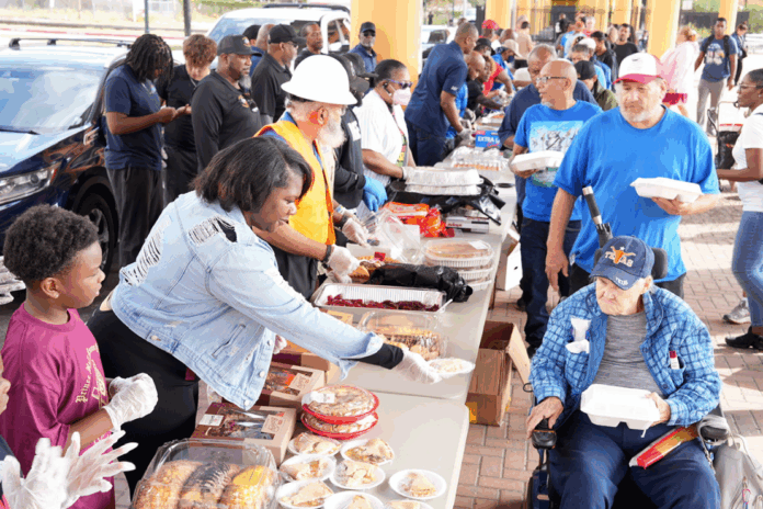 District Council 19 held its Thanksgiving Community Outreach Program for the Homeless downtown which provided a full-course Thanksgiving meal to those less fortunate. All Masonic bodies within the district supported the program which fed more than 150 individuals. (Photo by Bro. Burrell Parmer)