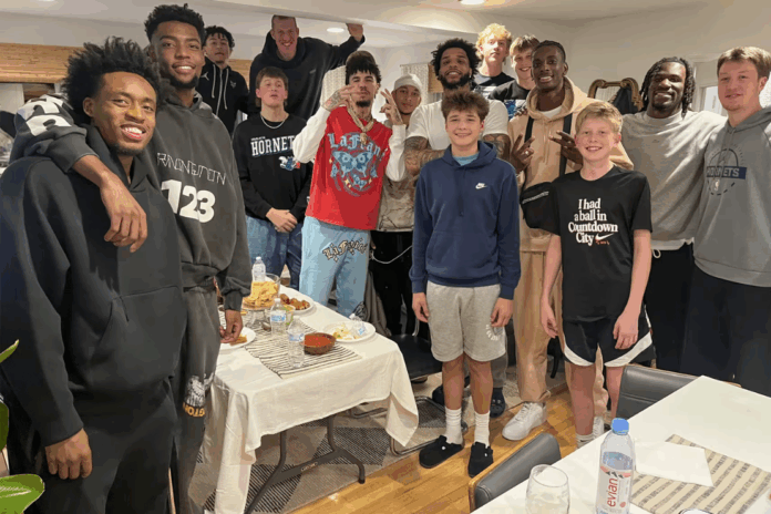 Kon Knueppel, a rookie for the Charlotte Hornets, had a game near his hometown of Milwaukee last week. Ahead of the game, his mom hosted the entire team and her photo went viral.Courtesy of Chari Nordgaard Knueppel