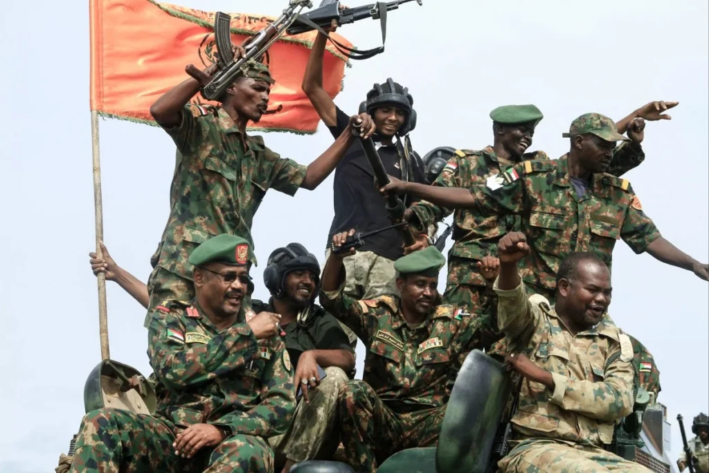 Members of Sudan's armed forces take part in a military parade held on Army Day in Gadaref, August 2024. Photograph: AFP/Getty Images