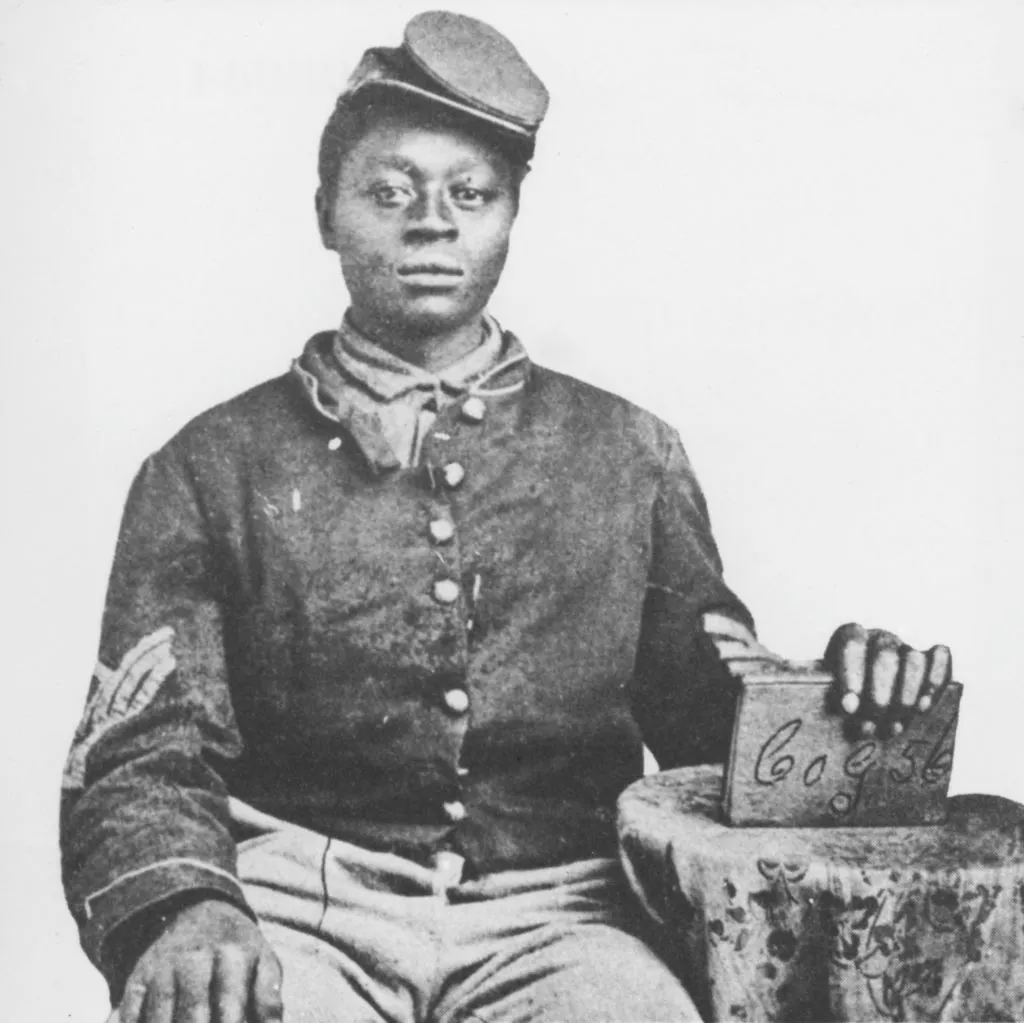 An African American Union soldier of the American Civil War, seated, in a studio portrait, circa 1863. Getty Images