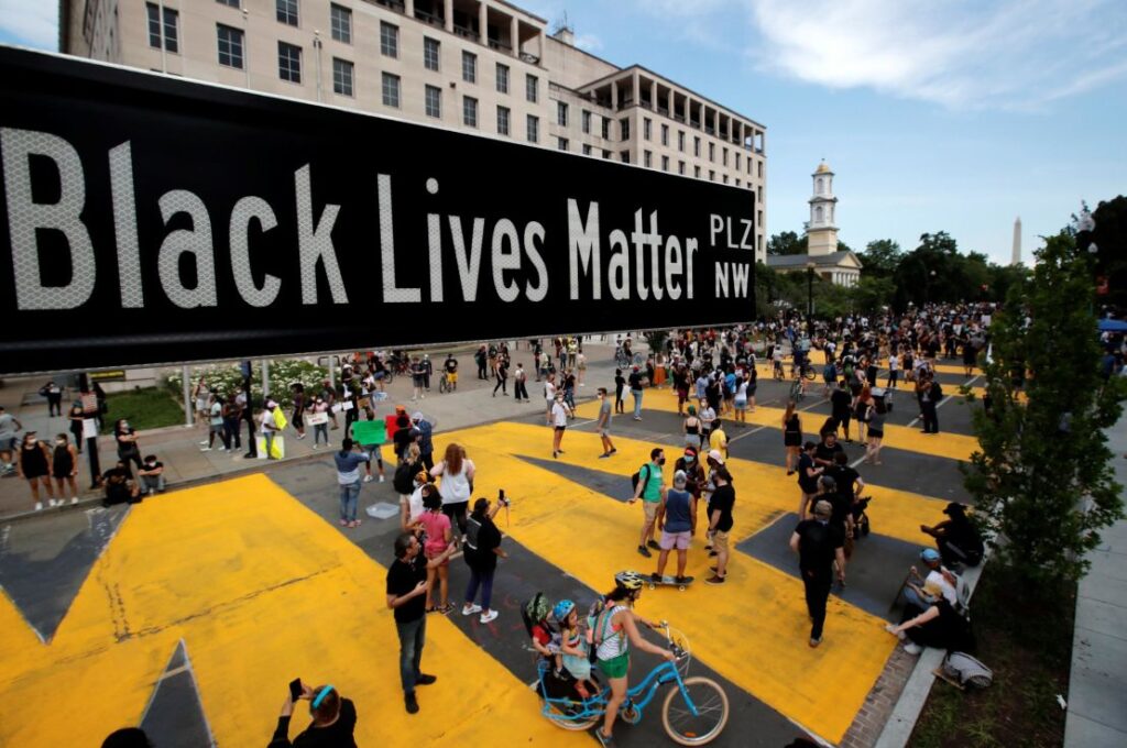 A street sign of Black Lives Matter Plaza is seen near St. John's Episcopal Church, as the protests against the death of George Floyd while in Minneapolis police custody continue. Carlos Barria/Reuters