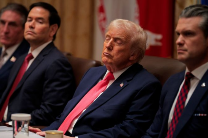 Donald Trump attends a meeting of his Cabinet in the Cabinet Room of the White House on December 02, 2025 in Washington, DC. (Photo by Chip Somodevilla/Getty Images)