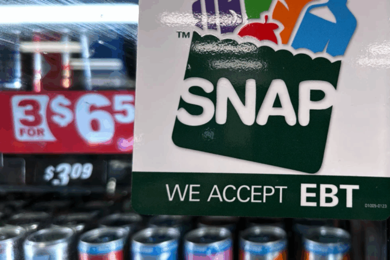 SNAP EBT information sign is displayed at a gas station in Riverwoods, Ill., Saturday, Nov. 1, 2025. (AP Photo/Nam Y. Huh, file)