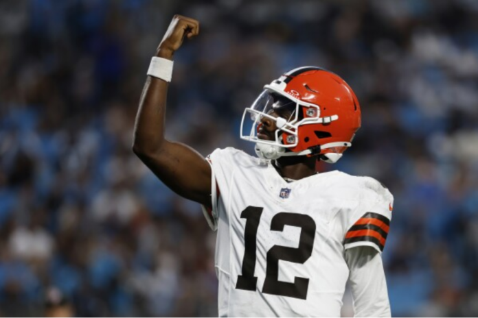 Cleveland Browns quarterback Shedeur Sanders celebrates after a touchdown pass against the Carolina Panthers during the first half of a preseason NFL football game on Friday, Aug. 8, 2025, in Charlotte, N.C. (AP Photo/Rusty Jones)