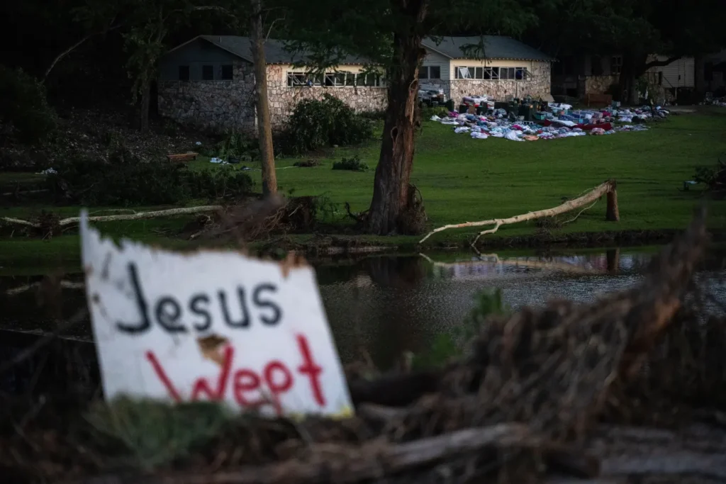 Camper’s belongings sit outside one of Camp Mystic’s cabins near the Guadalupe River after a flash flood swept through the area, July 7, 2025, in Hunt, Texas. (AP Photo/Eli Hartman, file)