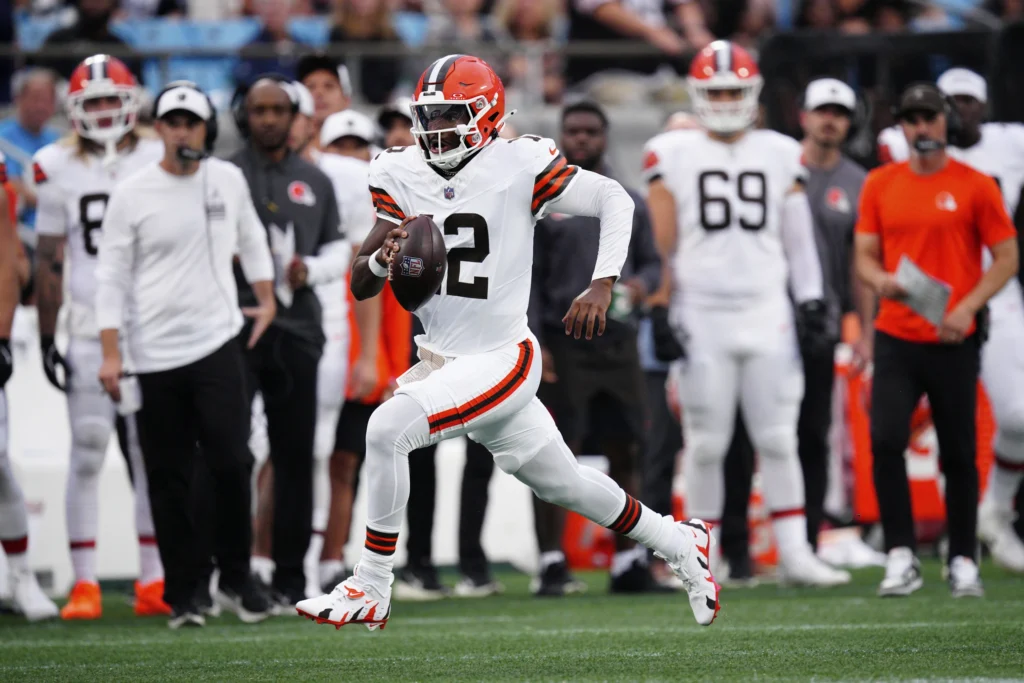 Cleveland Browns quarterback Shedeur Sanders runs against the Carolina Panthers during the first half of a preseason NFL football game on Friday, Aug. 8, 2025, in Charlotte, N.C. (AP Photo/Jacob Kupferman)