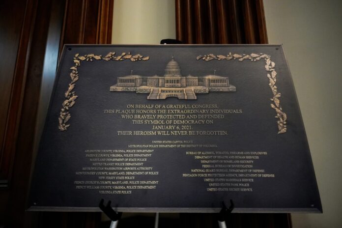 A replica plaque commemorating the Jan. 6, 2021 Capitol riot (AP Photo/Julia Demaree Nikhinson)