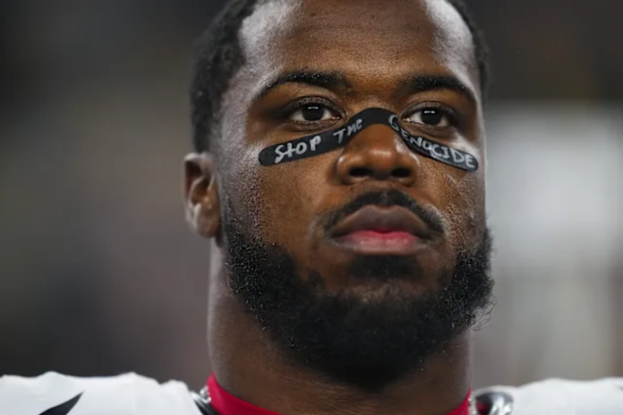 Texans linebacker Azeez Al-Shaair wears eye black with the message 