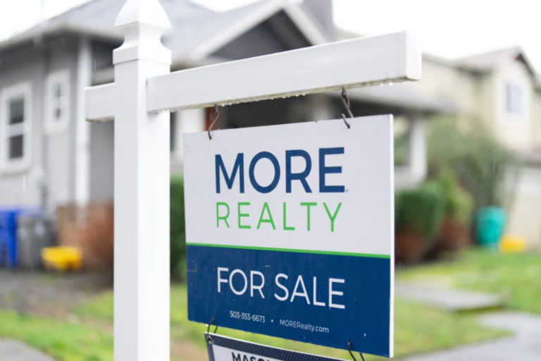 A “For Sale” sign is seen on Tuesday, Jan. 6, 2026, in Portland, Ore. (AP Photo/Jenny Kane)