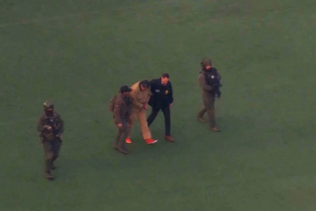 This image taken from video shows Venezuelan President Nicolas Maduro being escorted to board a helicopter for transport to Manhattan Federal Court, Monday, Jan. 5, 2026, in New York.
(WABC via AP)