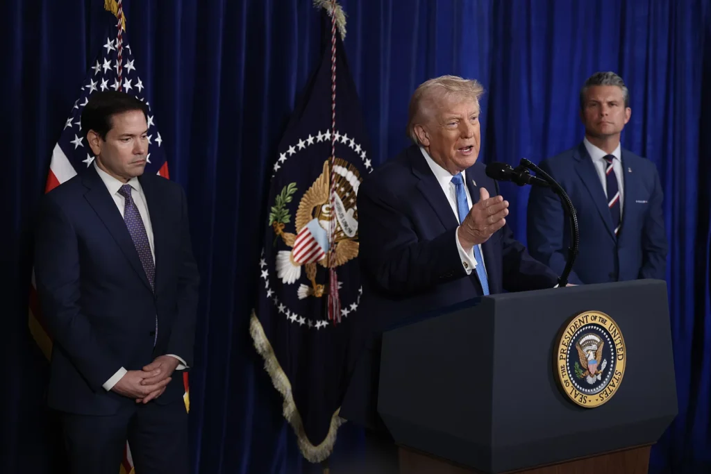 Secretary of State Marco Rubio and Secretary of Defense Pete Hegseth listen as President Trump addresses the media during a news conference at his Mar-a-Lago club on Saturday in Palm Beach, Fla.

Joe Raedle/Getty Images
