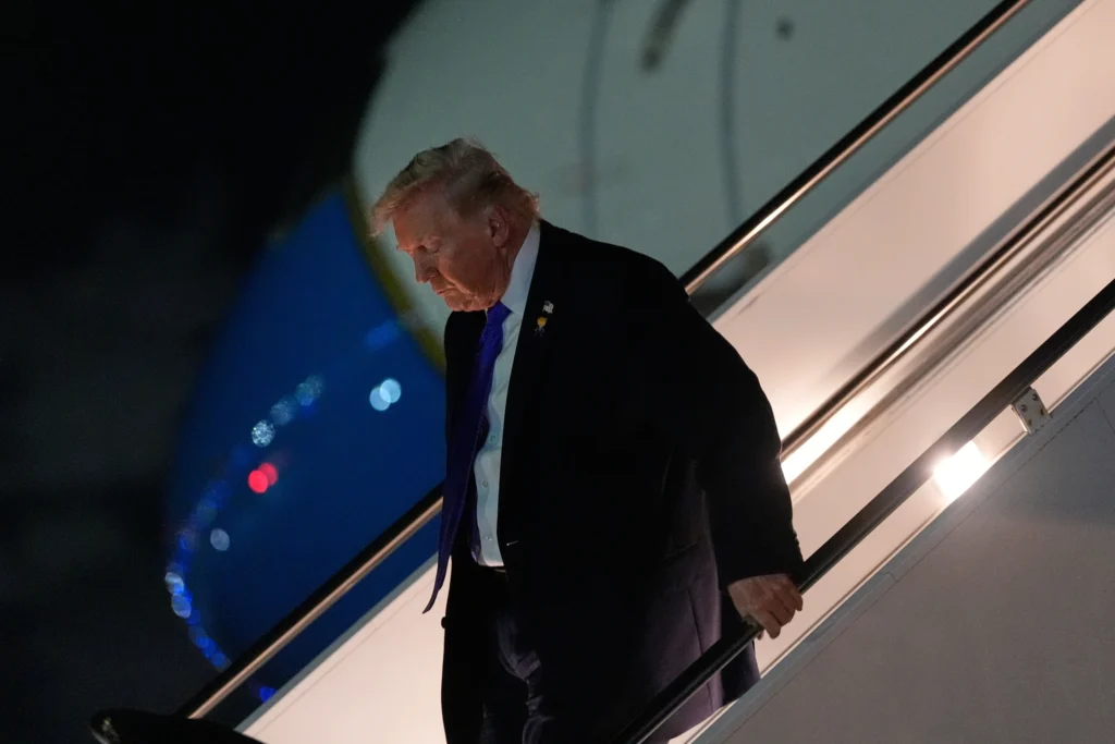 President Donald Trump arrives on Air Force One at Palm Beach International Airport, Friday, Jan. 9, 2025, in West Palm Beach, Fla. (AP Photo/Julia Demaree Nikhinson)