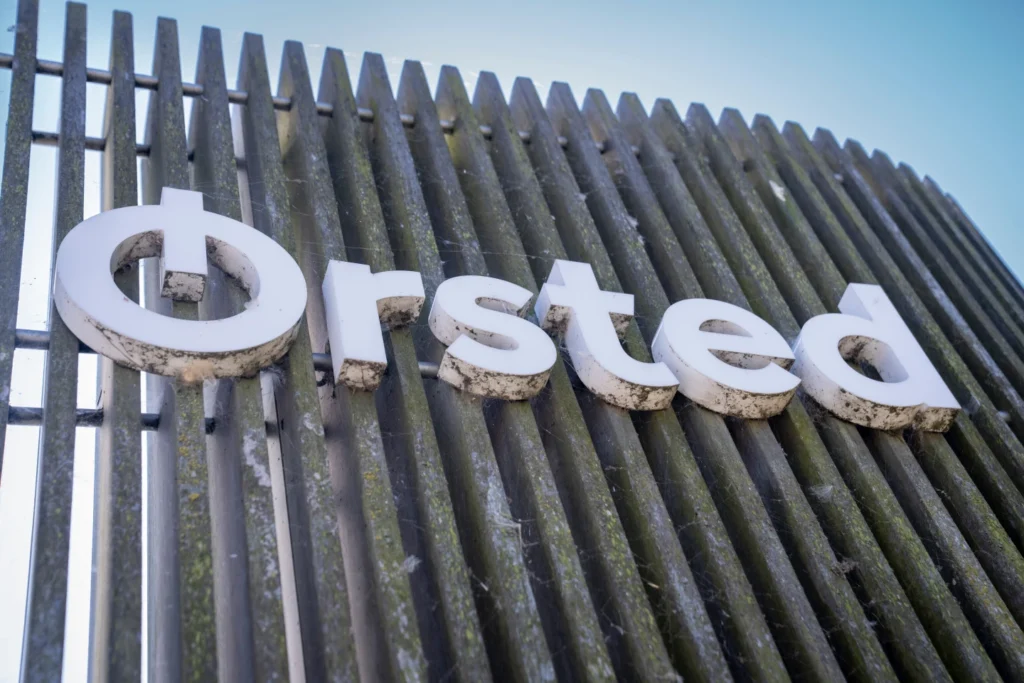 The logo for the Danish company Orsted is displayed on the exterior of the Avedore Power Station in Hvidovre, Copenhagen, Aug. 19, 2025. (Sebastian Elias Uth/Ritzau Scanpix via AP)