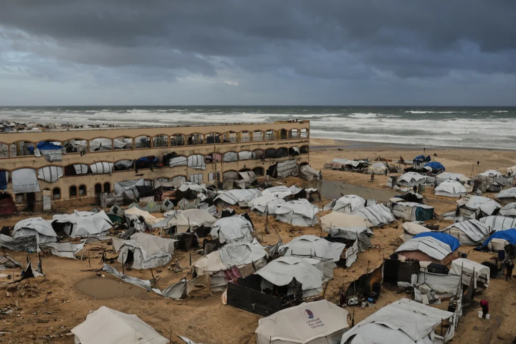 A displacement camp sheltering Palestinians on a beach amid stormy weather is seen in Gaza City, Jan. 13, 2026. (AP Photo/Jehad Alshrafi, File)