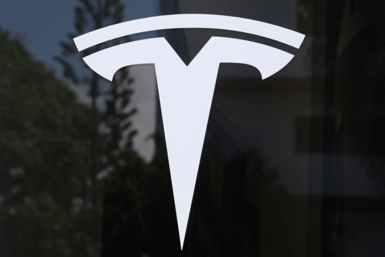 The Tesla logo is displayed at a Tesla dealership Thursday, Mar. 13, 2025, in Miami. (AP Photo/Lynne Sladky, File)