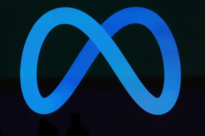 A Meta logo is shown on a video screen at LlamaCon 2025, an AI developer conference, in Menlo Park, Calif., April 29, 2025. (AP Photo/Jeff Chiu, File)