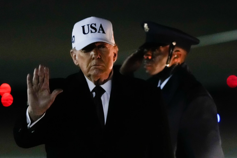 President Donald Trump waves after arriving on Air Force One from Florida, Sunday, Jan. 11, 2026, at Joint Base Andrews, Md. (AP Photo/Julia Demaree Nikhinson)