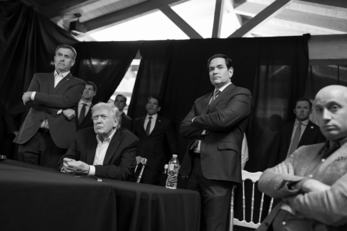 In this photo released by the White House, President Donald Trump monitors U.S. military operations in Venezuela, with CIA Director John Ratcliffe, left, Secretary of State Marco Rubio and White House deputy chief of staff Stephen Miller, right, at Mar-a-Lago in Palm Beach, Fla., Saturday, Jan. 3, 2026. (Molly Riley/The White House via AP)
